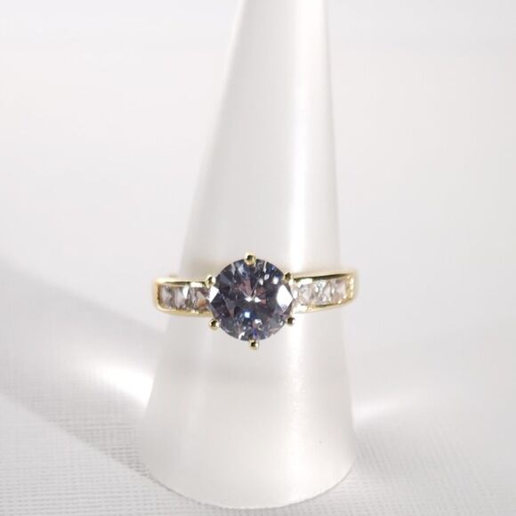 Simulated White Diamond Ring in a Goldtone Ring Size 8 - Picture 2 of 9